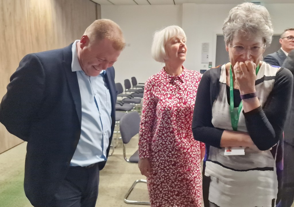 Julie Chaplain and Terry Galloway share a joke.
