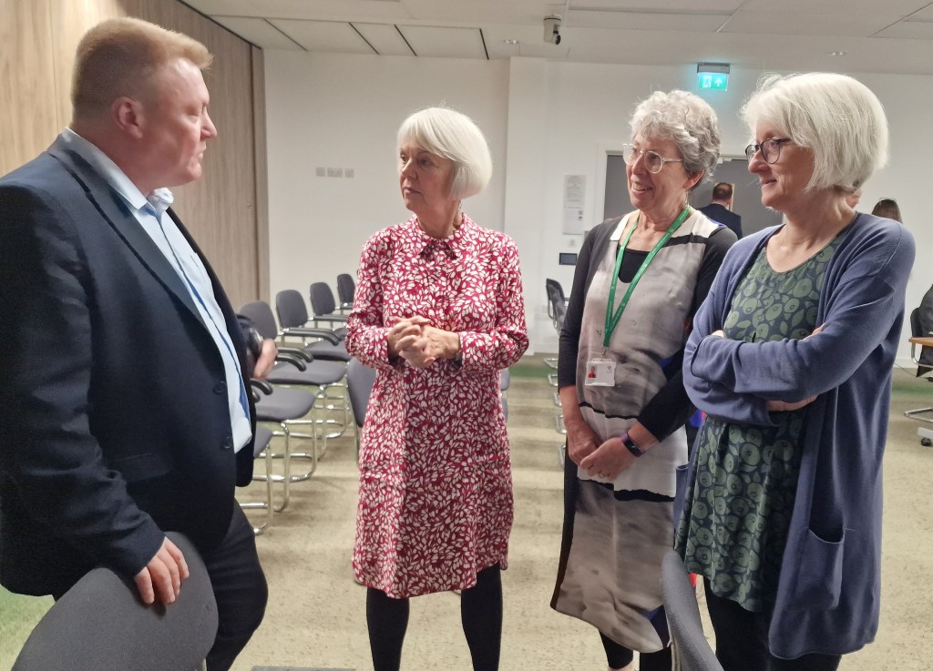 Terry Galloway, Penny Gowland, Julie Chaplain and Liz Plant discuss the meeting.